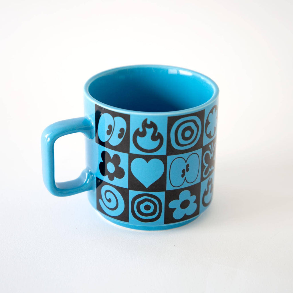 Blue mug with black check pattern and various illustrations on a white background