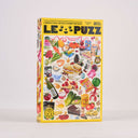 LE PUZZ puzzle box with colorful illustrations on a white background